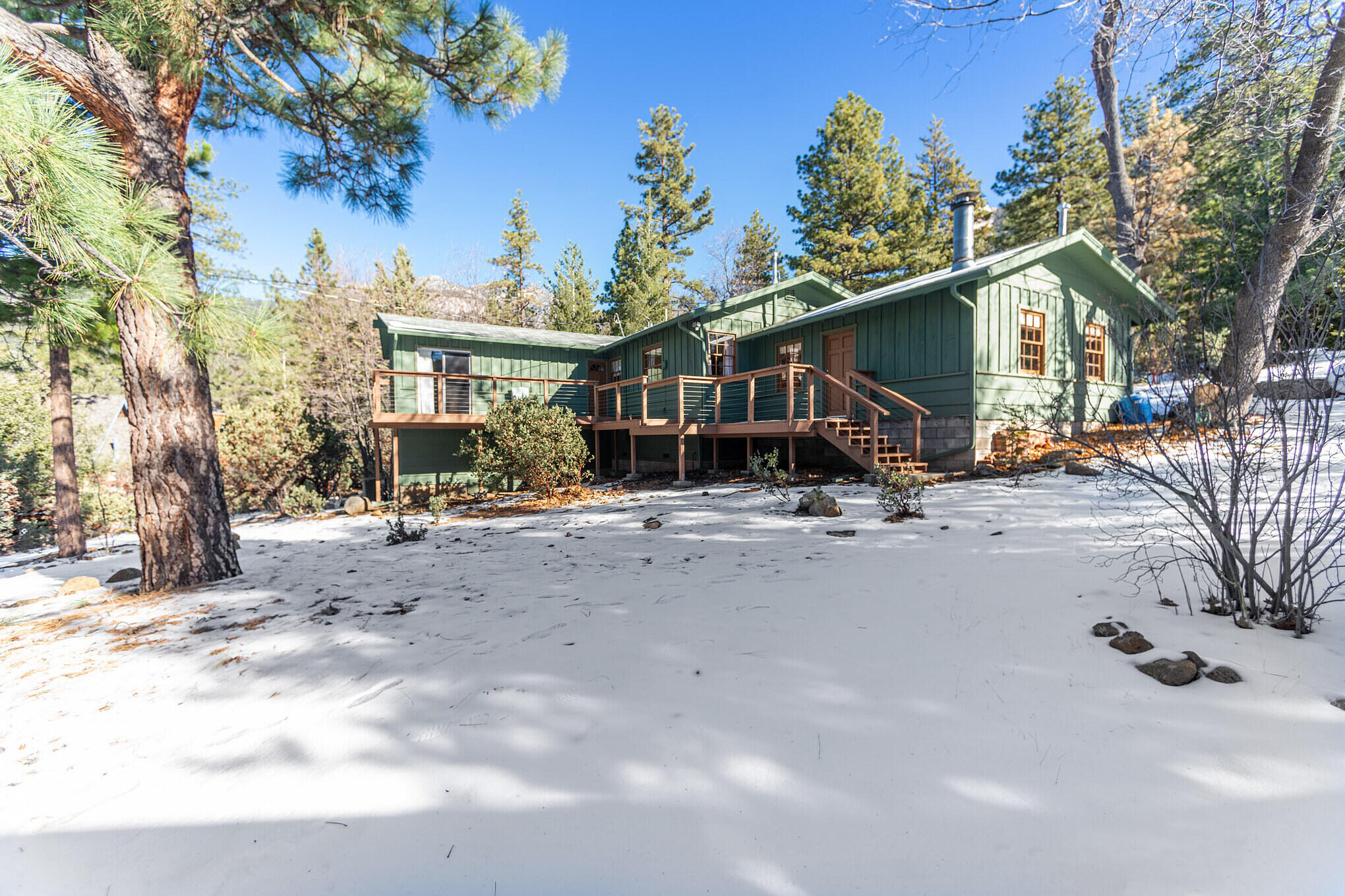 25465 Seneca Road Idyllwild, CA 92549 - Photo 29 of 38 a view of a house with a tree in the background
