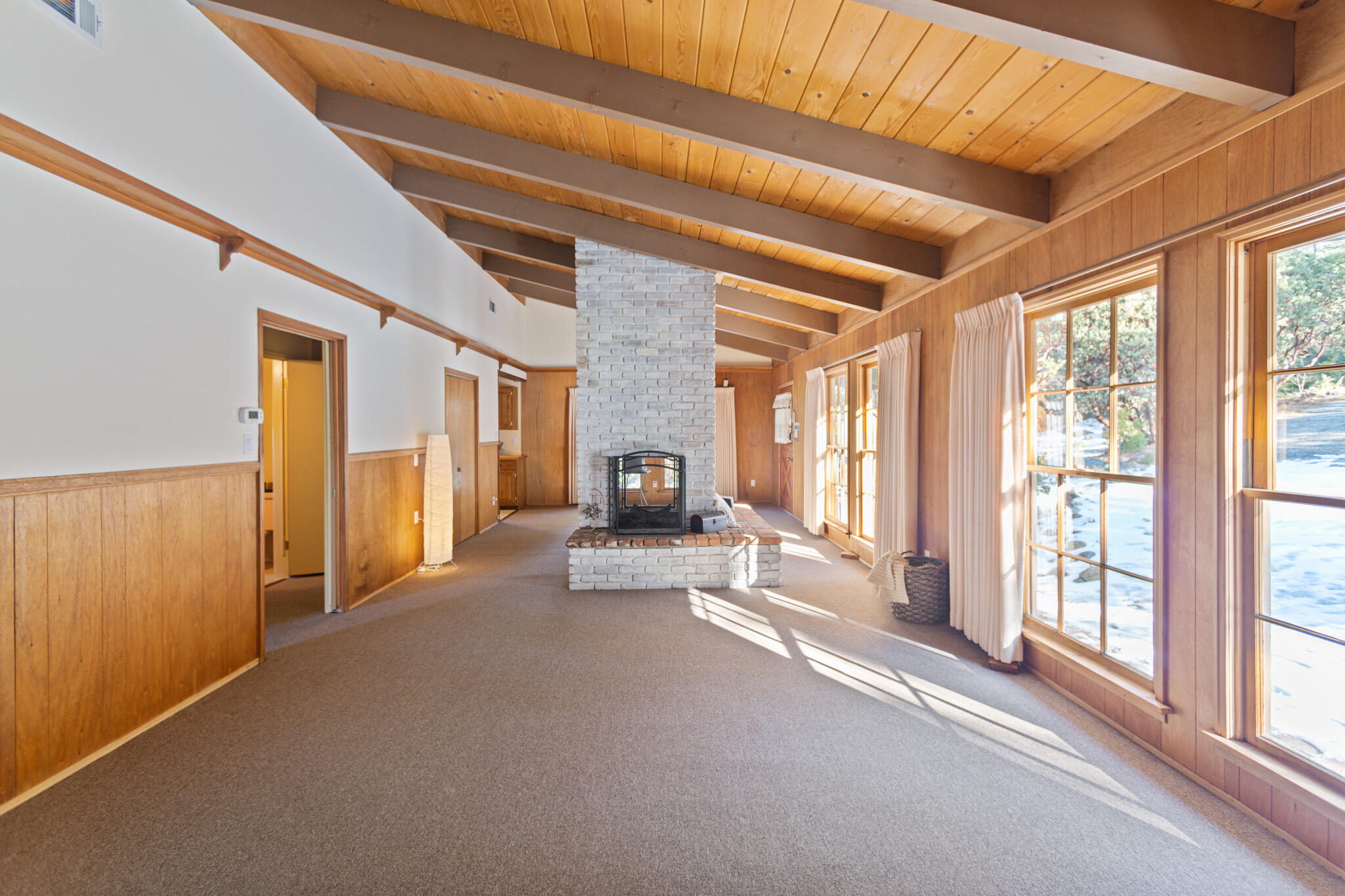 25465 Seneca Road Idyllwild, CA 92549 - Photo 10 of 38 a view of empty room with wooden floor and fan