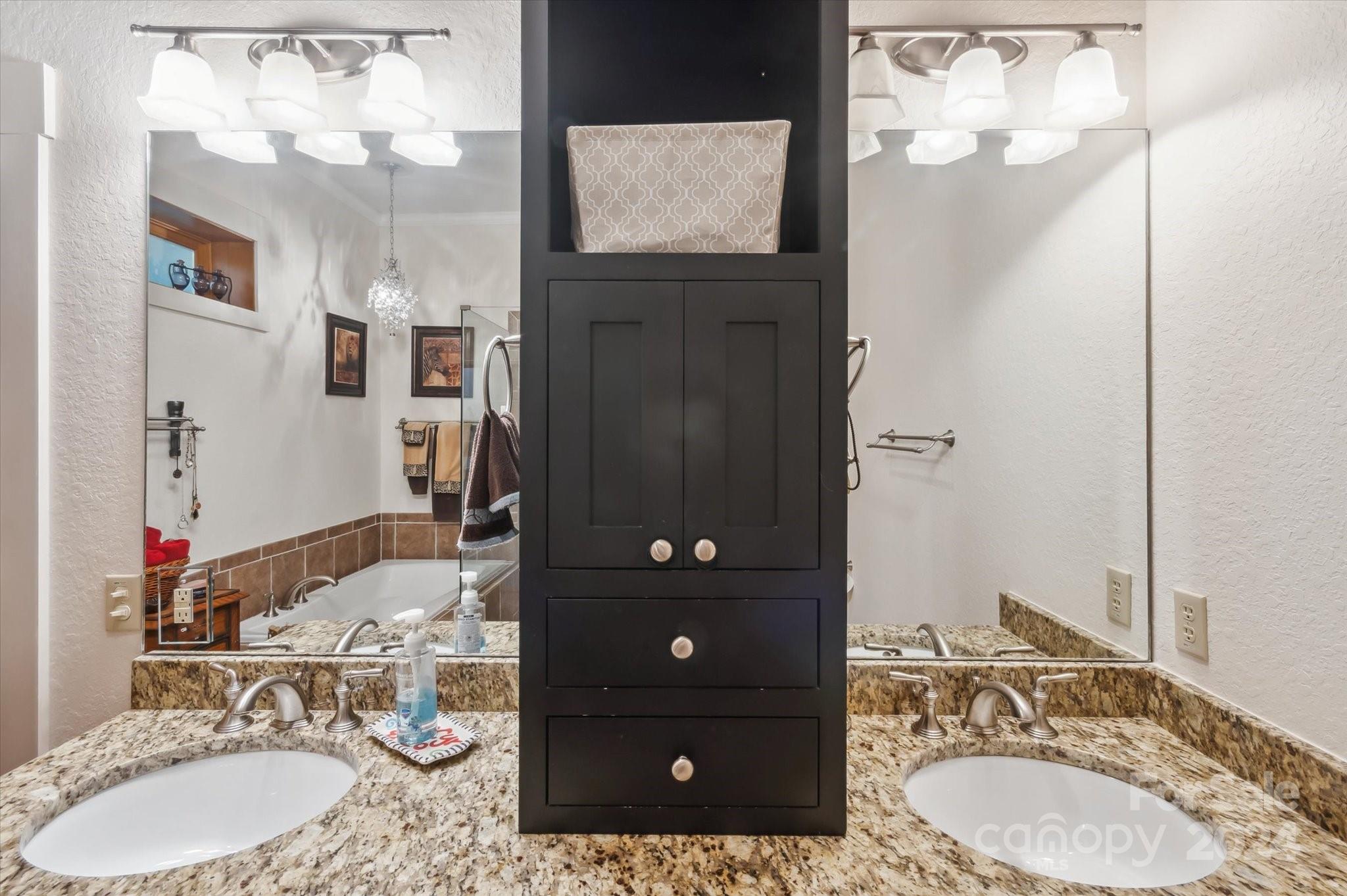 39 Elms Rest Cullowhee, NC 28723 - Photo 35 of 45 a bathroom with a sink vanity and a mirror
