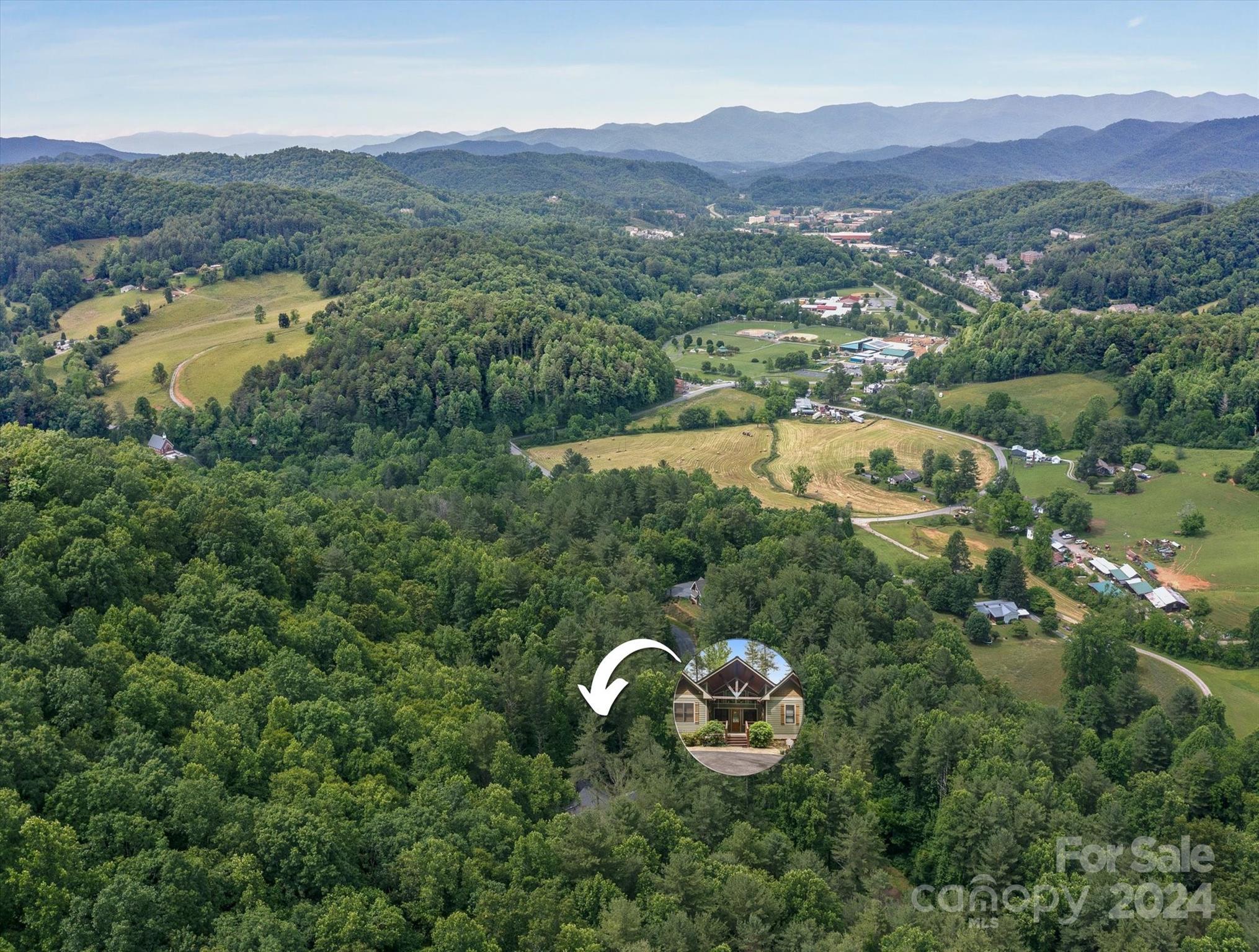 39 Elms Rest Cullowhee, NC 28723 - Photo 44 of 45 an aerial view of a house with mountain view