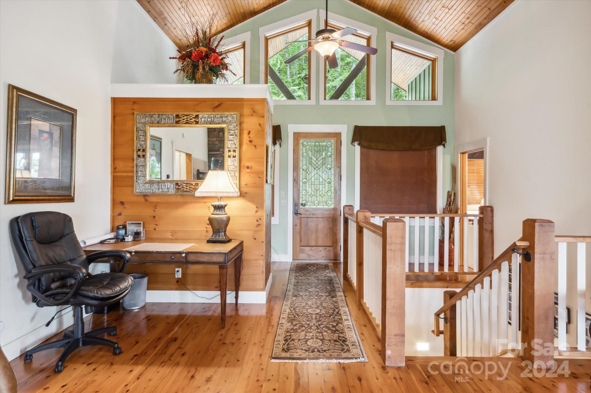 39 Elms Rest Cullowhee, NC 28723 - Photo 6 of 45 a view of a workspace with furniture window and wooden floor