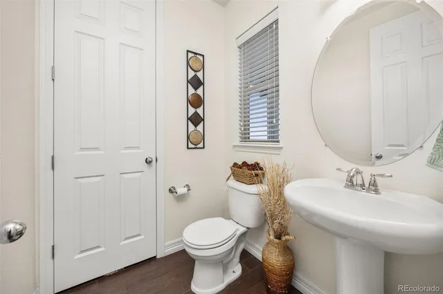 a living room with fireplace furniture and a flat screen tv