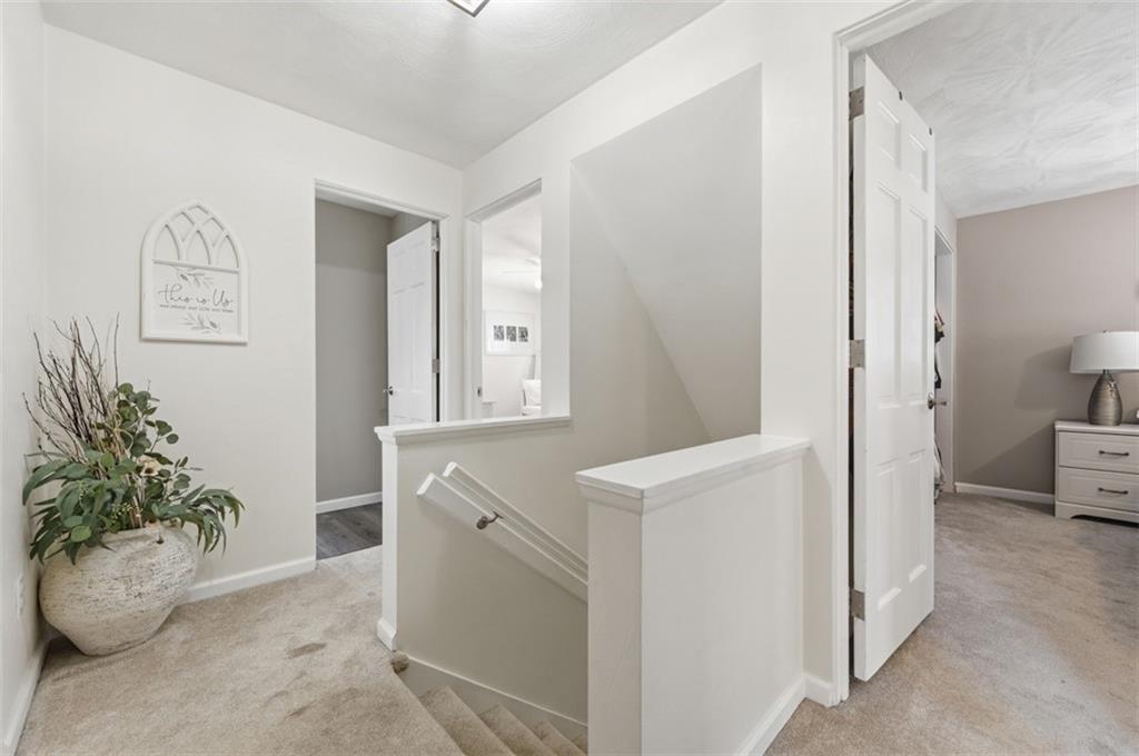 129 Meadowbrook Road Renfrew, PA 16053 - Photo 19 of 45 a view of hallway with paintings on the wall
