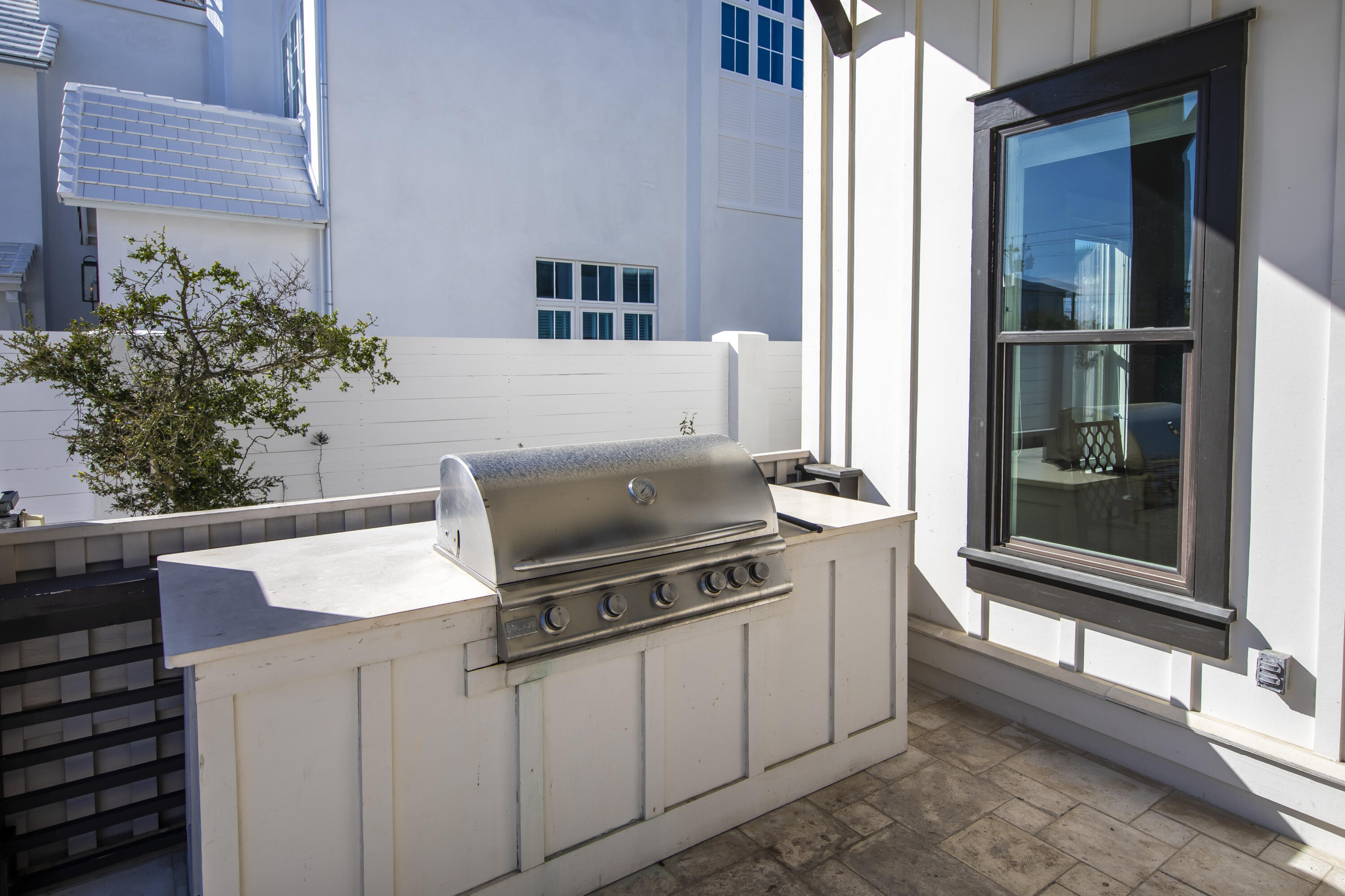 8947 East County Highway 30A Inlet Beach, FL 32461 - Photo 11 of 69 a view of a chairs and table in a room
