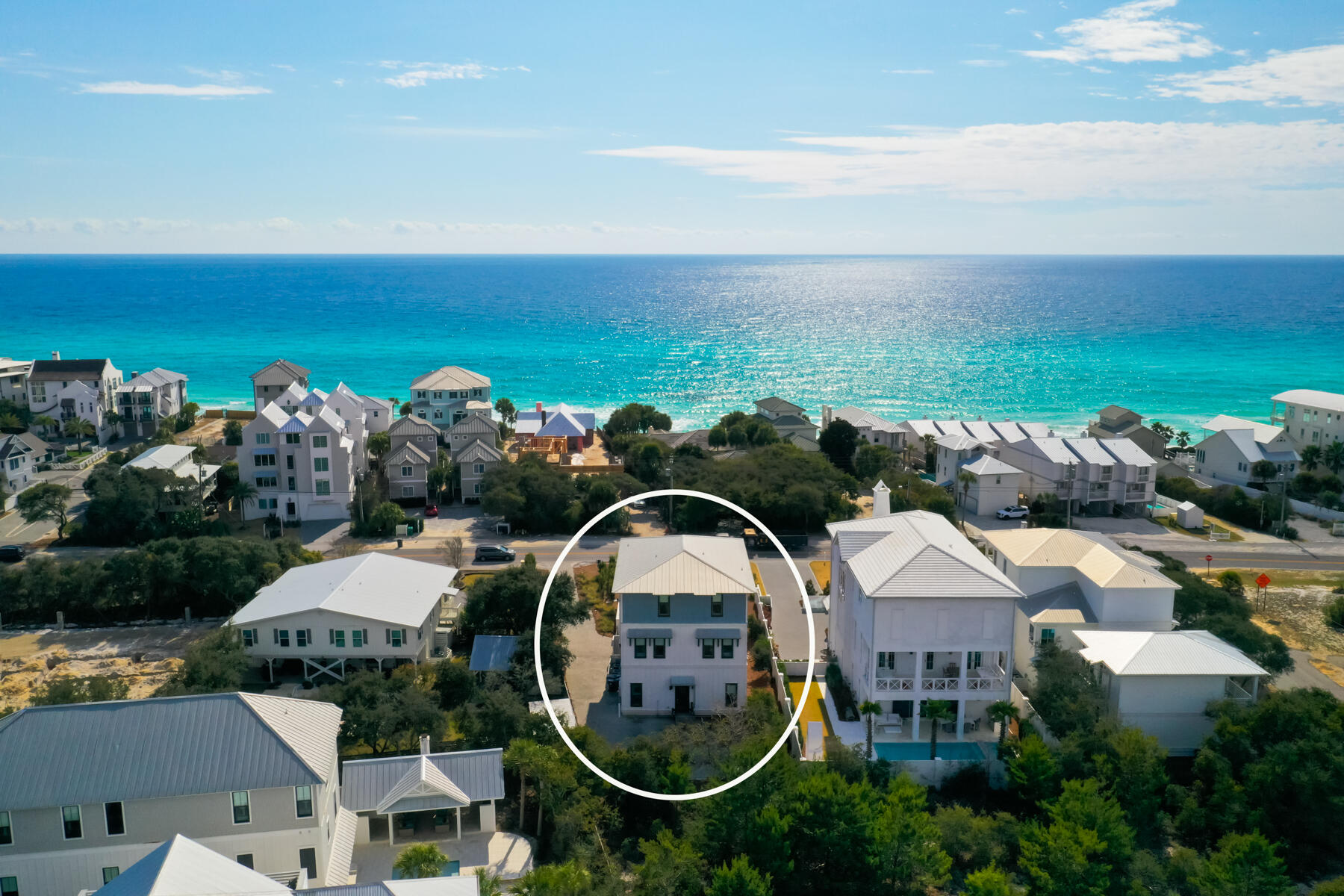 8947 East County Highway 30A Inlet Beach, FL 32461 - Photo 15 of 55 an aerial view of a house with yard and mountain view in back