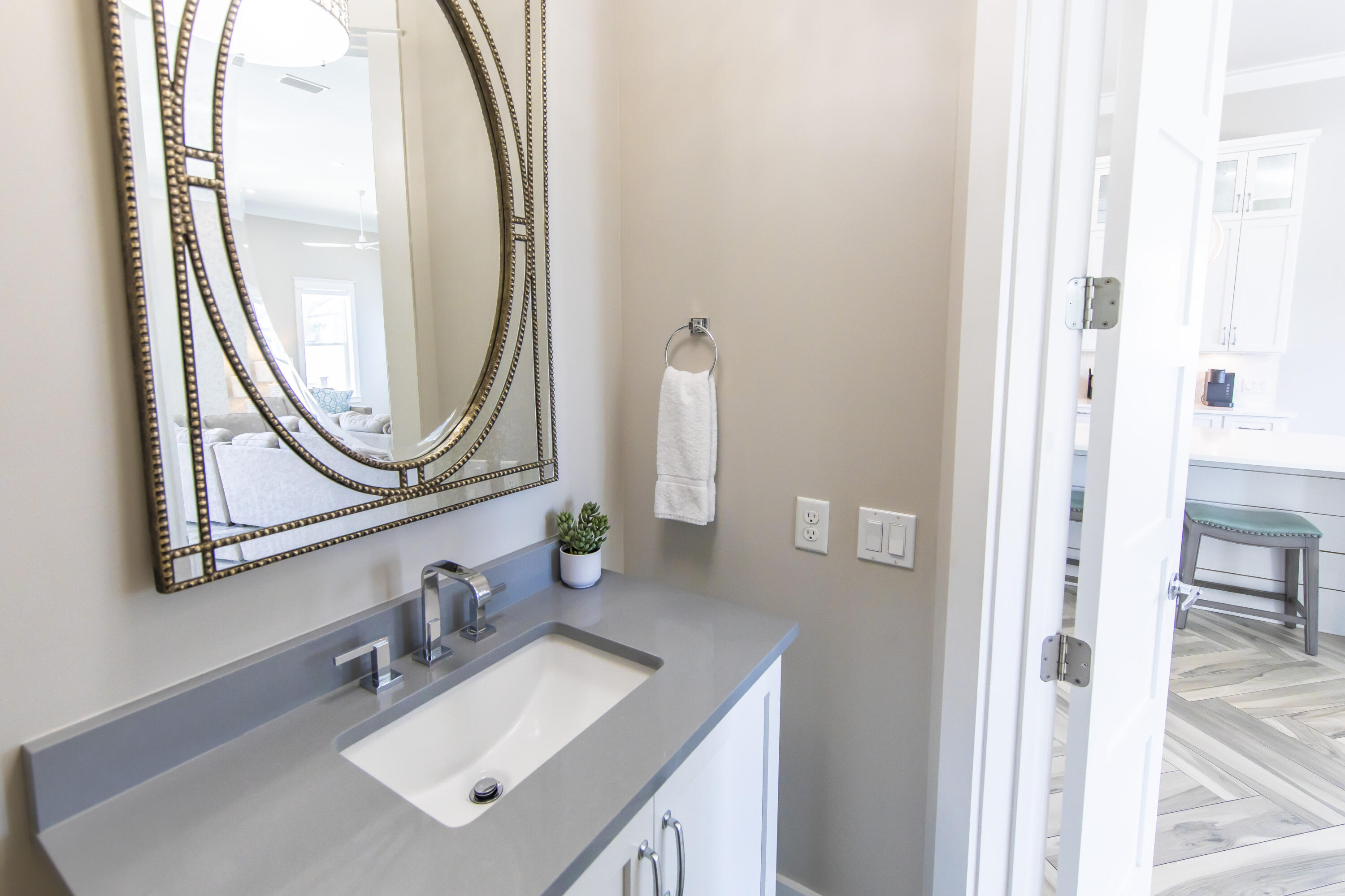 8947 East County Highway 30A Inlet Beach, FL 32461 - Photo 23 of 69 a bathroom with a sink vanity and a mirror