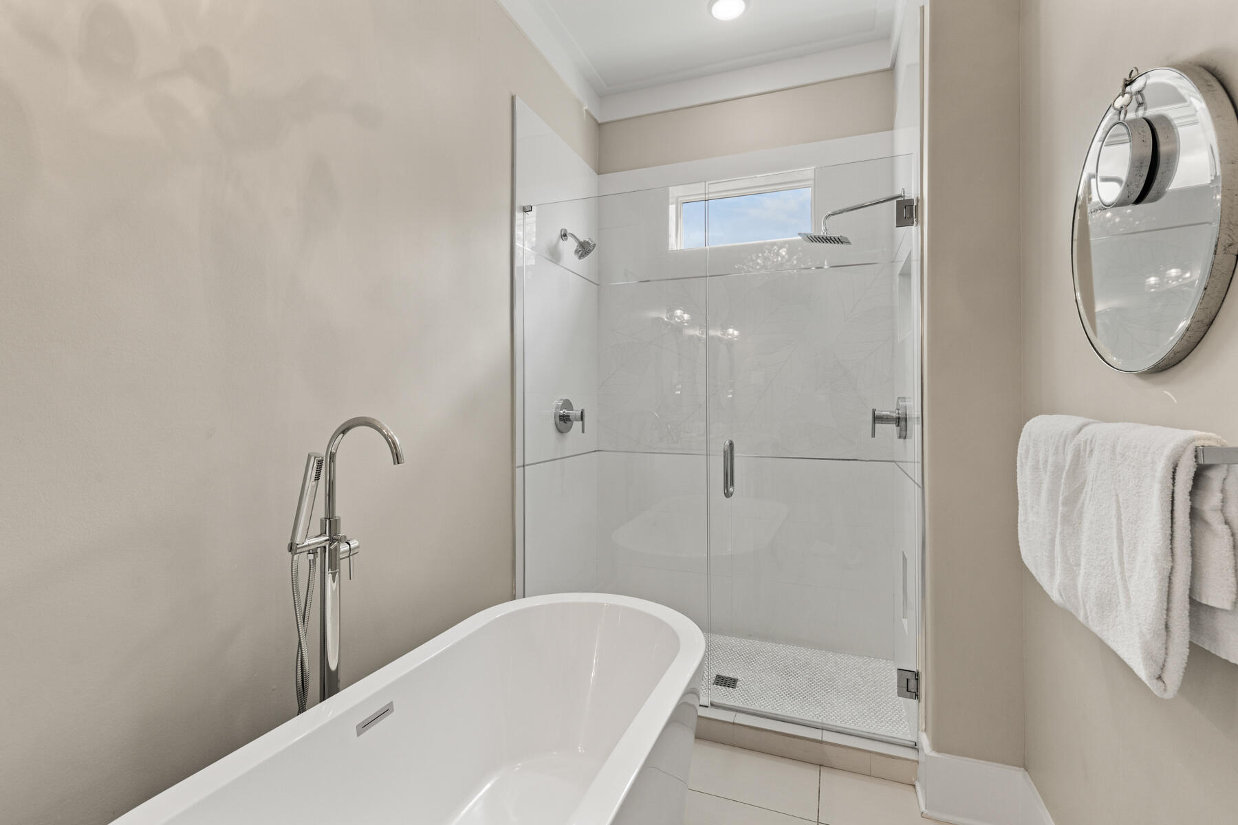 8947 East County Highway 30A Inlet Beach, FL 32461 - Photo 23 of 55 a bathroom with a tub a sink and a mirror