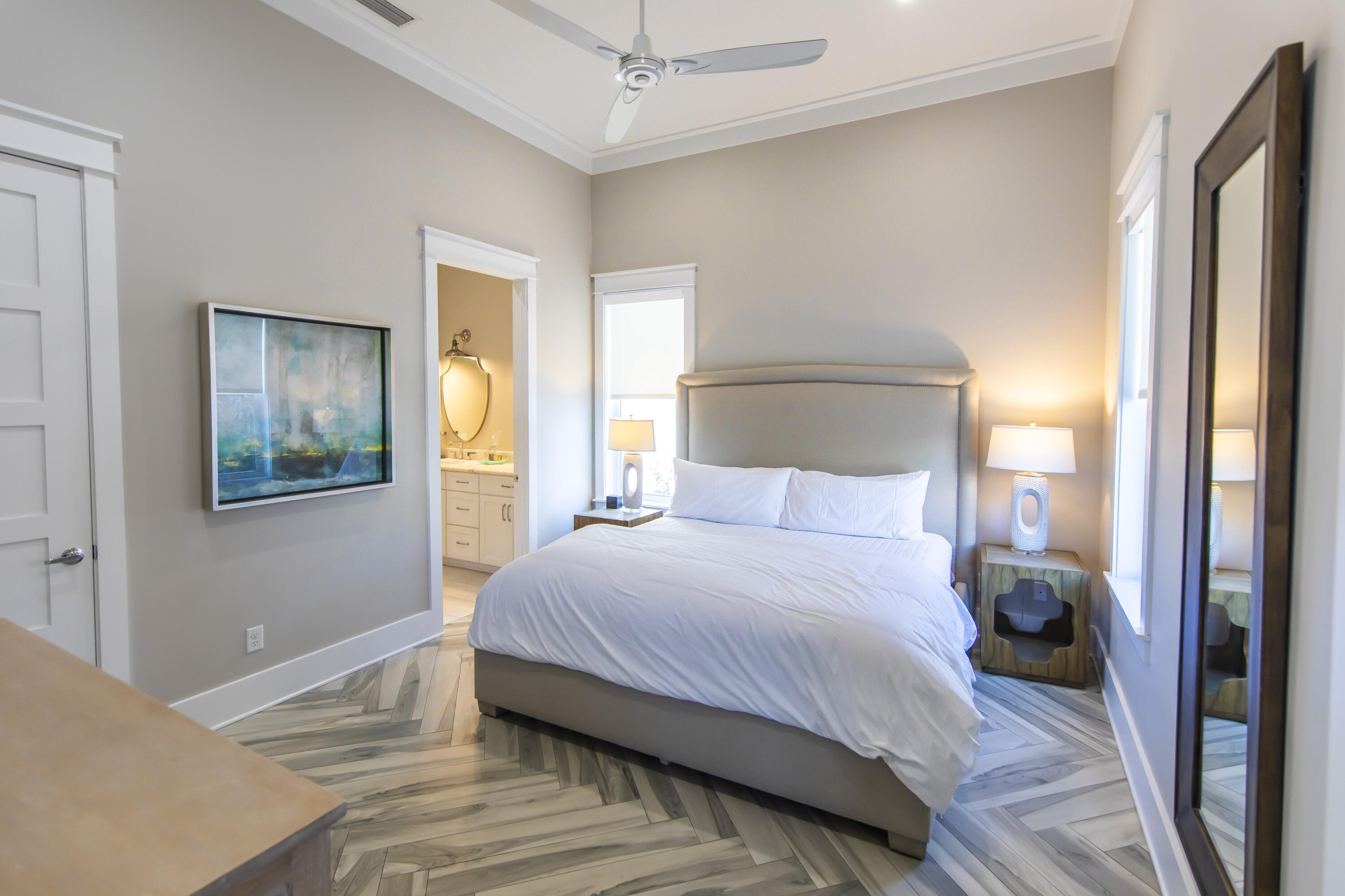 8947 East County Highway 30A Inlet Beach, FL 32461 - Photo 24 of 69 a bedroom with a bed and a painting on the wall