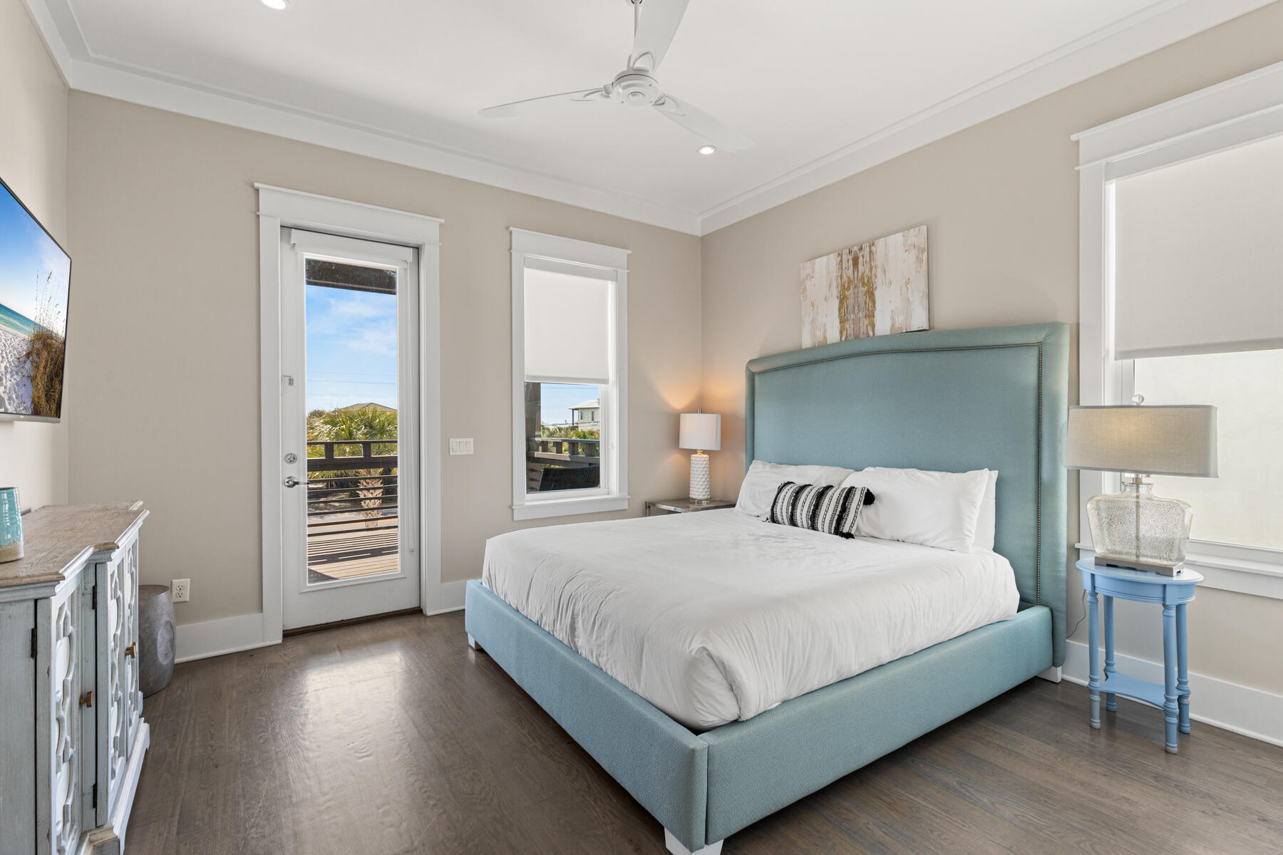 8947 East County Highway 30A Inlet Beach, FL 32461 - Photo 25 of 55 a bedroom with a large bed and a chandelier