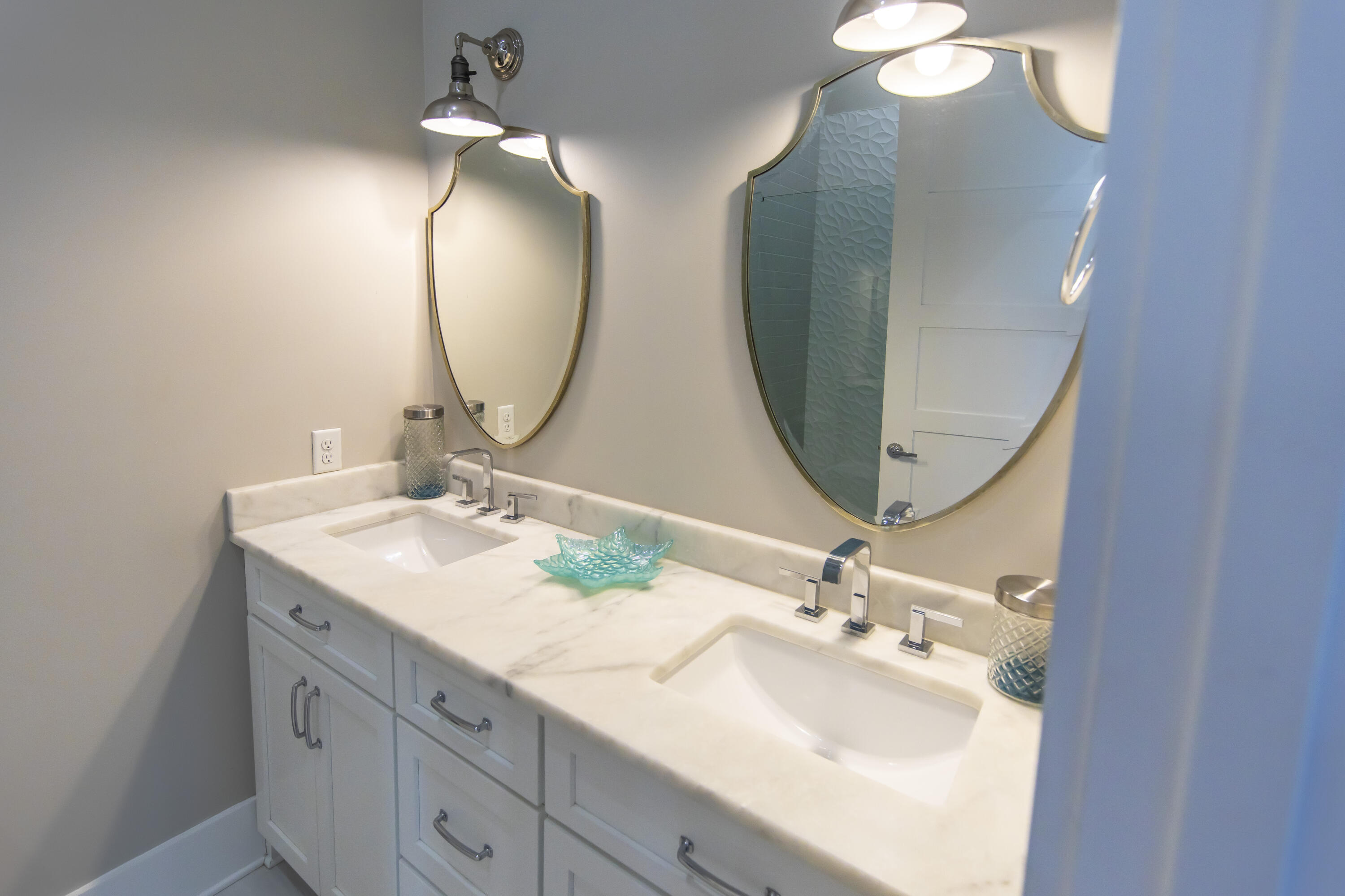 8947 East County Highway 30A Inlet Beach, FL 32461 - Photo 26 of 69 a bathroom with a double vanity sink and a mirror