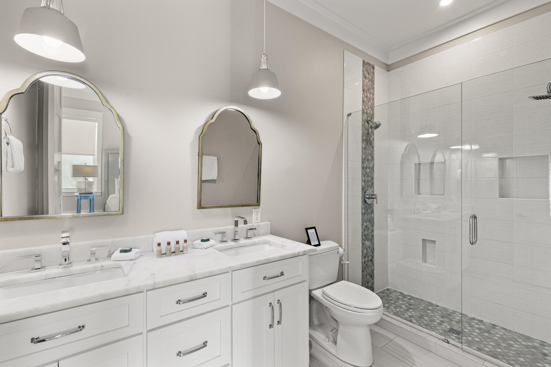 8947 East County Highway 30A Inlet Beach, FL 32461 - Photo 26 of 55 a bathroom with a double vanity sink toilet and shower