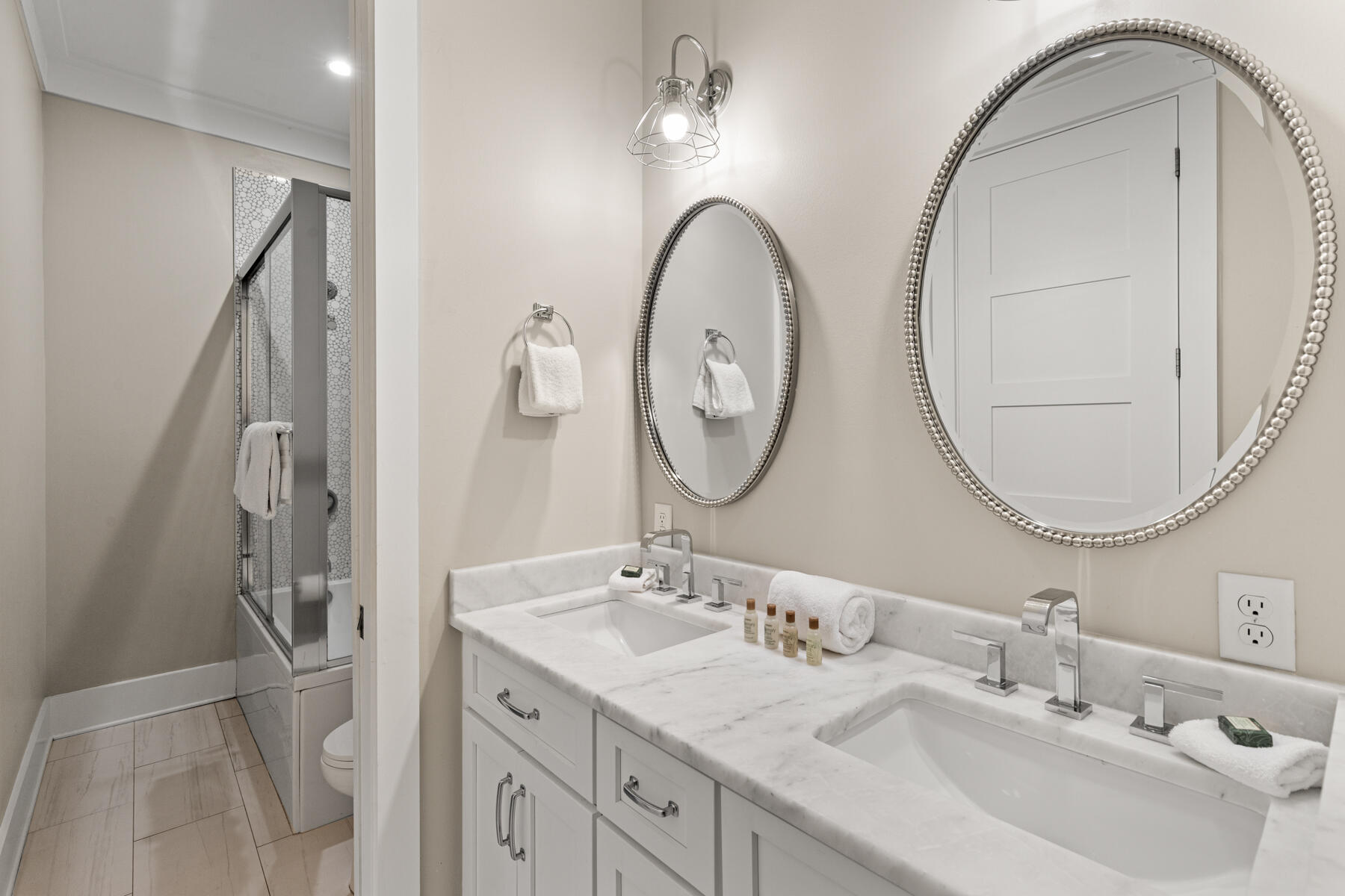 8947 East County Highway 30A Inlet Beach, FL 32461 - Photo 31 of 55 a bathroom with a double vanity sink and a mirror