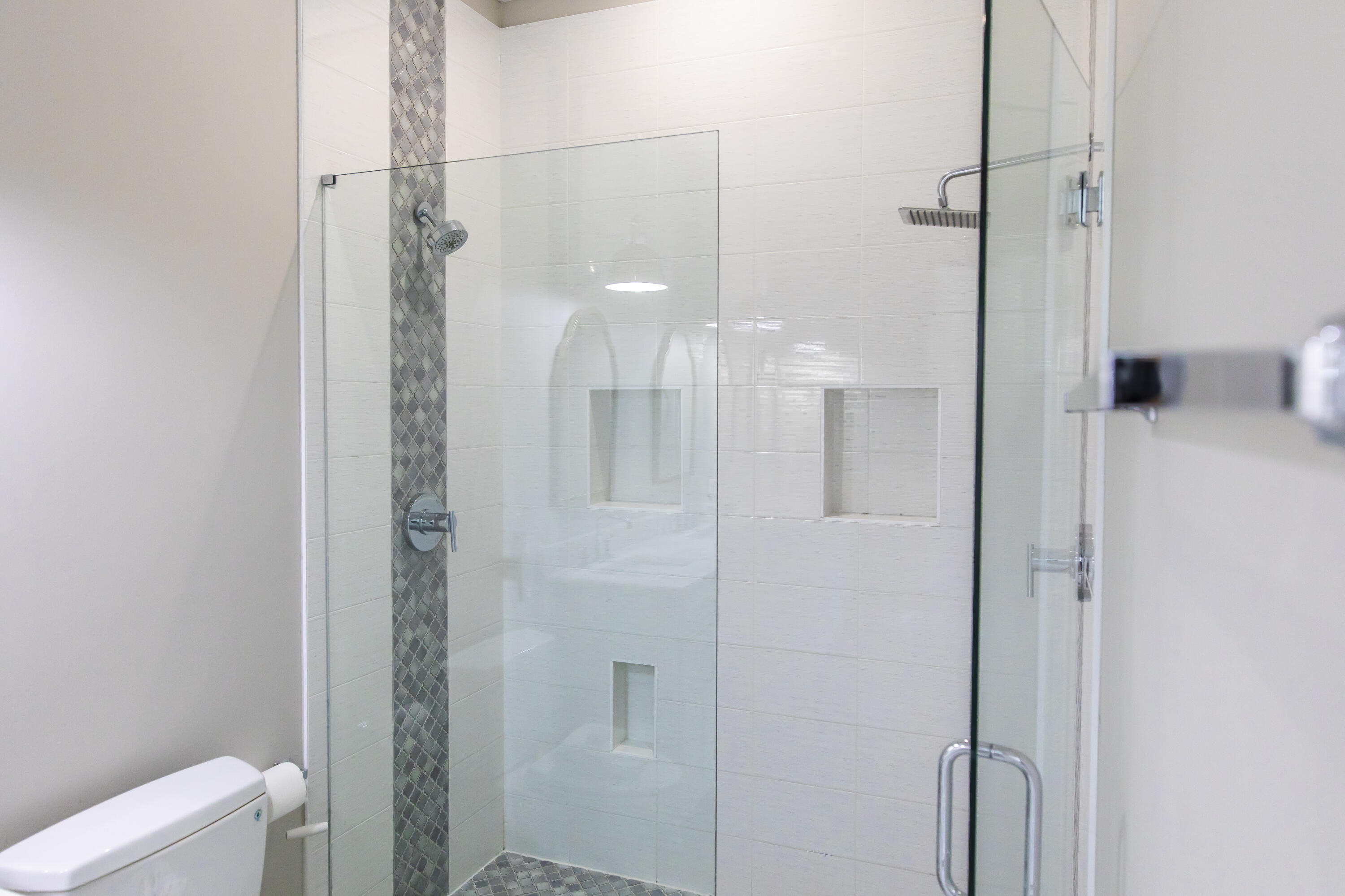 8947 East County Highway 30A Inlet Beach, FL 32461 - Photo 40 of 69 a bathroom with a shower and a toilet