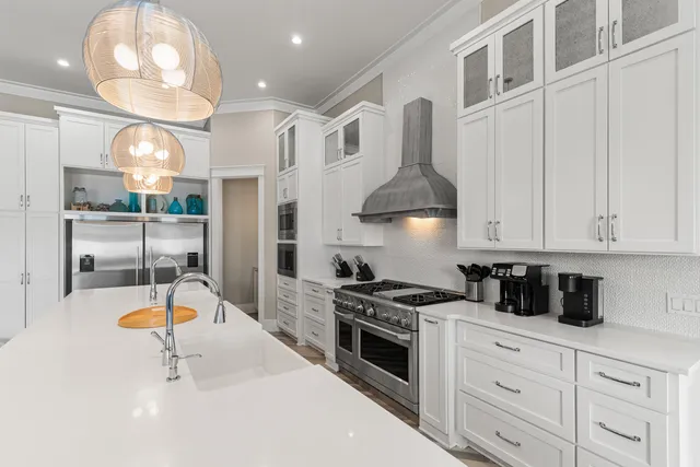 a living room with furniture potted plant and a window