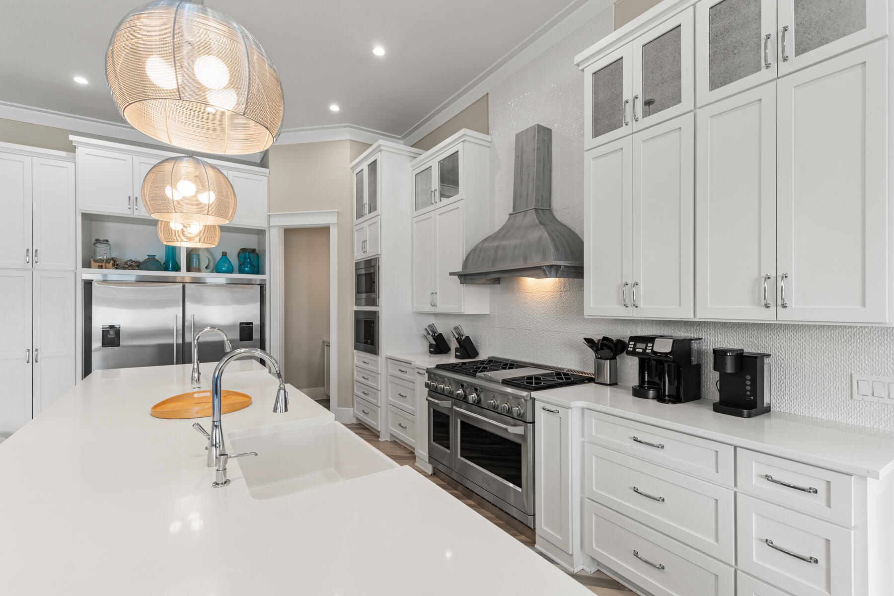 8947 East County Highway 30A Inlet Beach, FL 32461 - Photo 4 of 55 a kitchen with stainless steel appliances a stove a sink dishwasher and cabinets