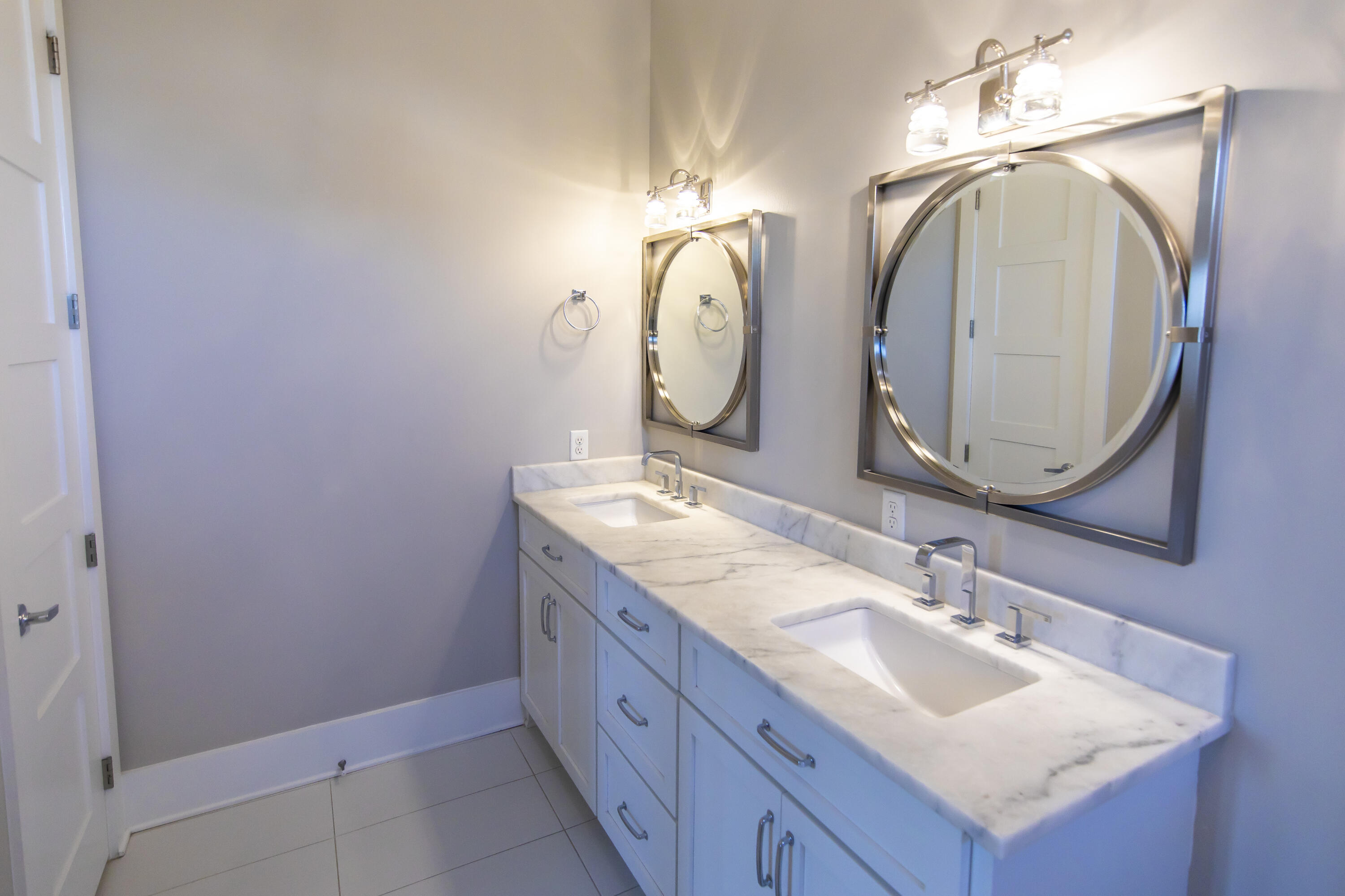 8947 East County Highway 30A Inlet Beach, FL 32461 - Photo 43 of 69 a bathroom with a double vanity sink and a mirror