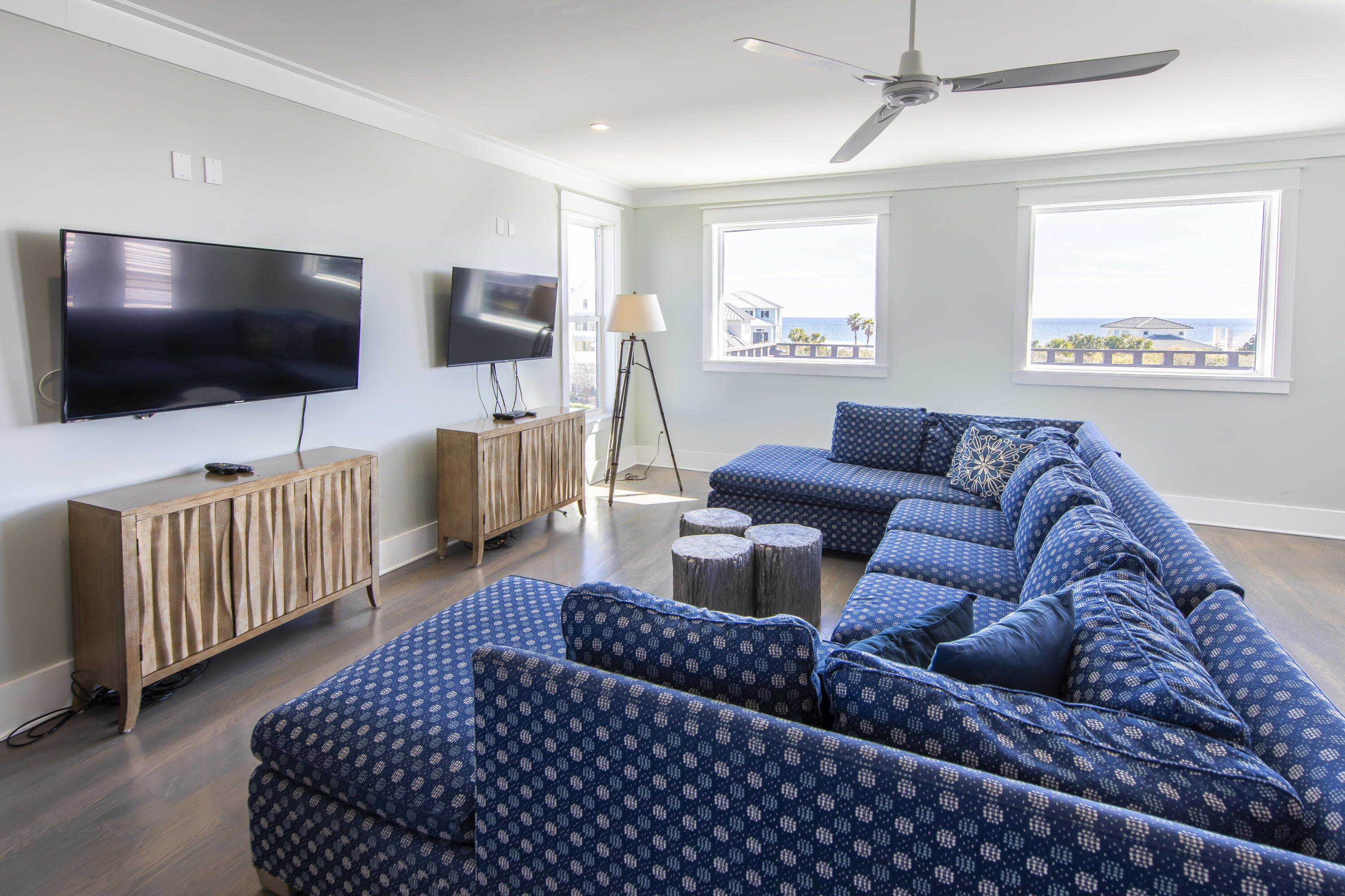 8947 East County Highway 30A Inlet Beach, FL 32461 - Photo 57 of 69 a living room with furniture and a flat screen tv
