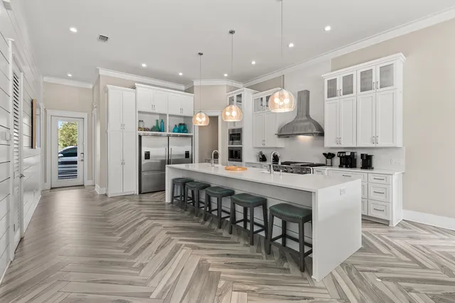 a living room with furniture potted plant and a window