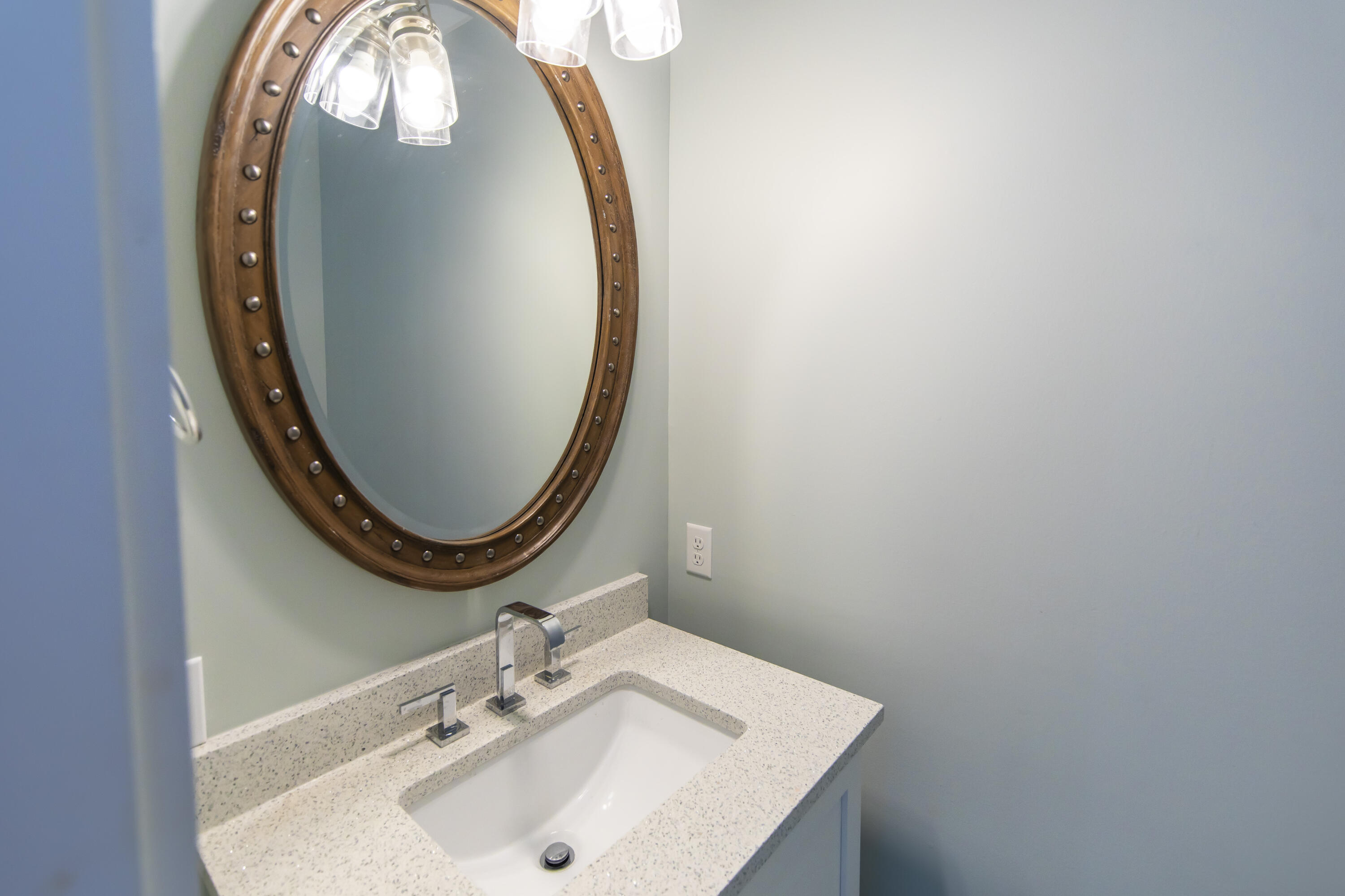8947 East County Highway 30A Inlet Beach, FL 32461 - Photo 63 of 69 a bathroom with a sink and a mirror