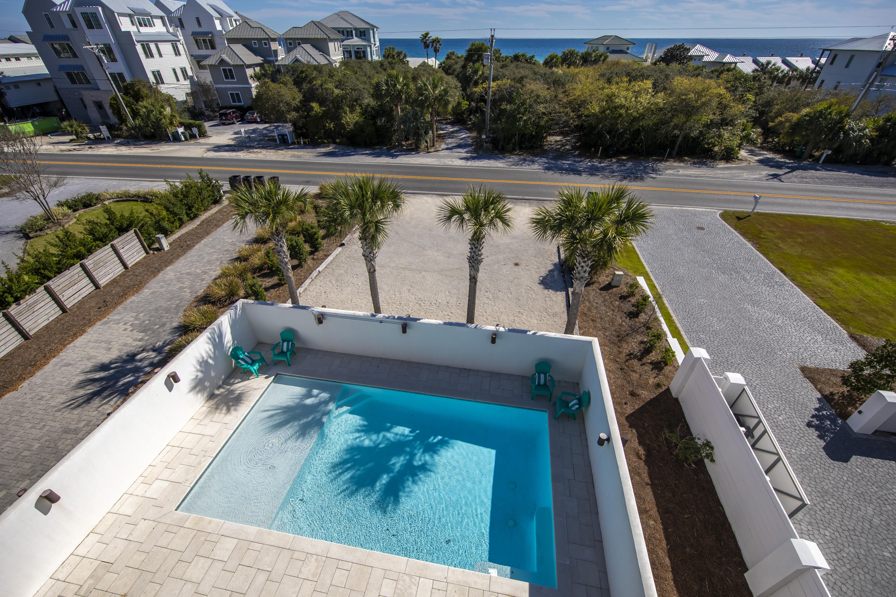 8947 East County Highway 30A Inlet Beach, FL 32461 - Photo 66 of 69 an aerial view of a swimming pool with a yard