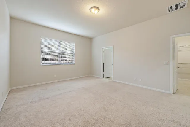 an empty room with windows