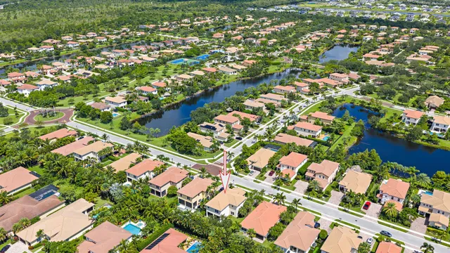 an aerial view of house with yard