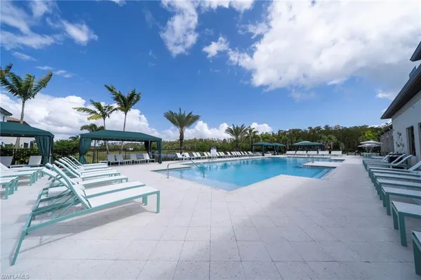 a view of a big yard with a large trees