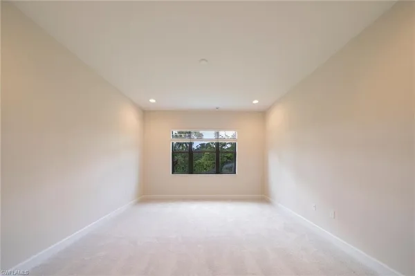 a kitchen with stainless steel appliances a refrigerator and a sink
