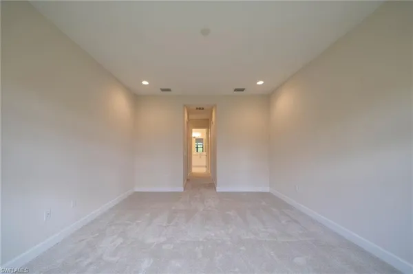 a view of a kitchen and a window