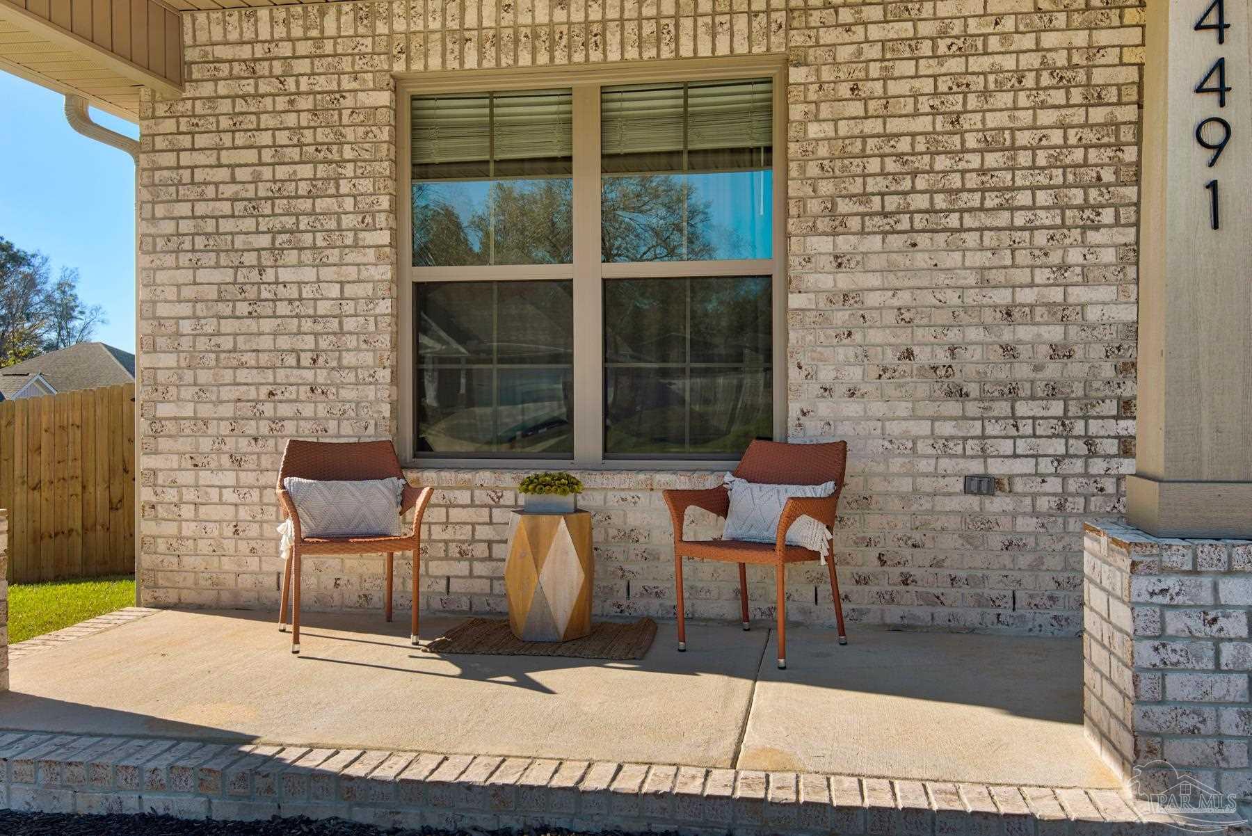 4491 Jude Way Pace, FL 32571 - Photo 3 of 49 Covered Front Porch in Soft Morning Sunshine!