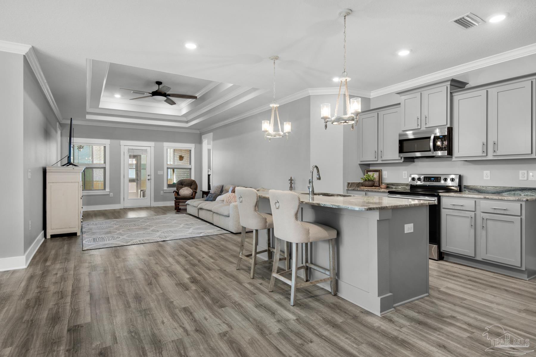 4491 Jude Way Pace, FL 32571 - Photo 6 of 49 Elegant LVT Flooring Throughout Main Area & Baths