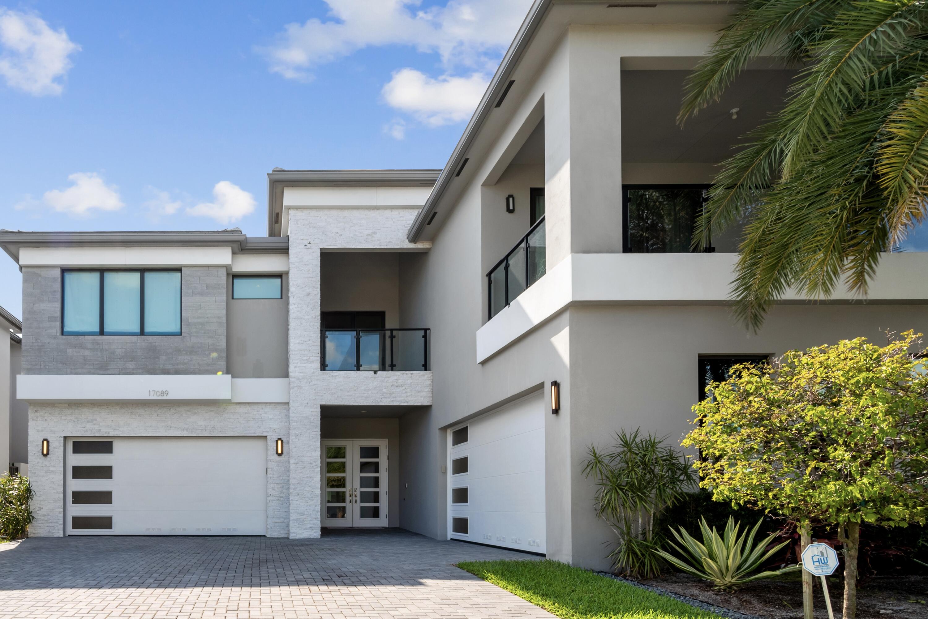 17089 Wandering Wave Avenue Boca Raton, FL 33496 - Photo 1 of 33 front of house