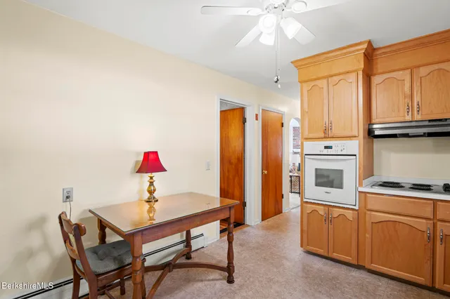 a view of a dining room with furniture