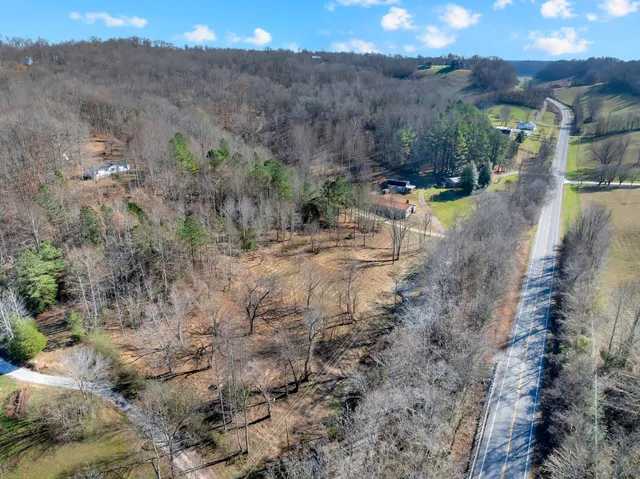 a view of a town with mountains in the background