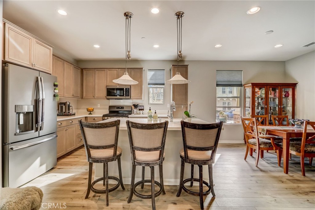193 Stonegate Road Camarillo, CA 93010 - Photo 11 of 39 a view of a dining room with furniture