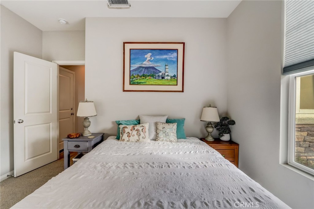 193 Stonegate Road Camarillo, CA 93010 - Photo 16 of 39 a bedroom with a bed and a window