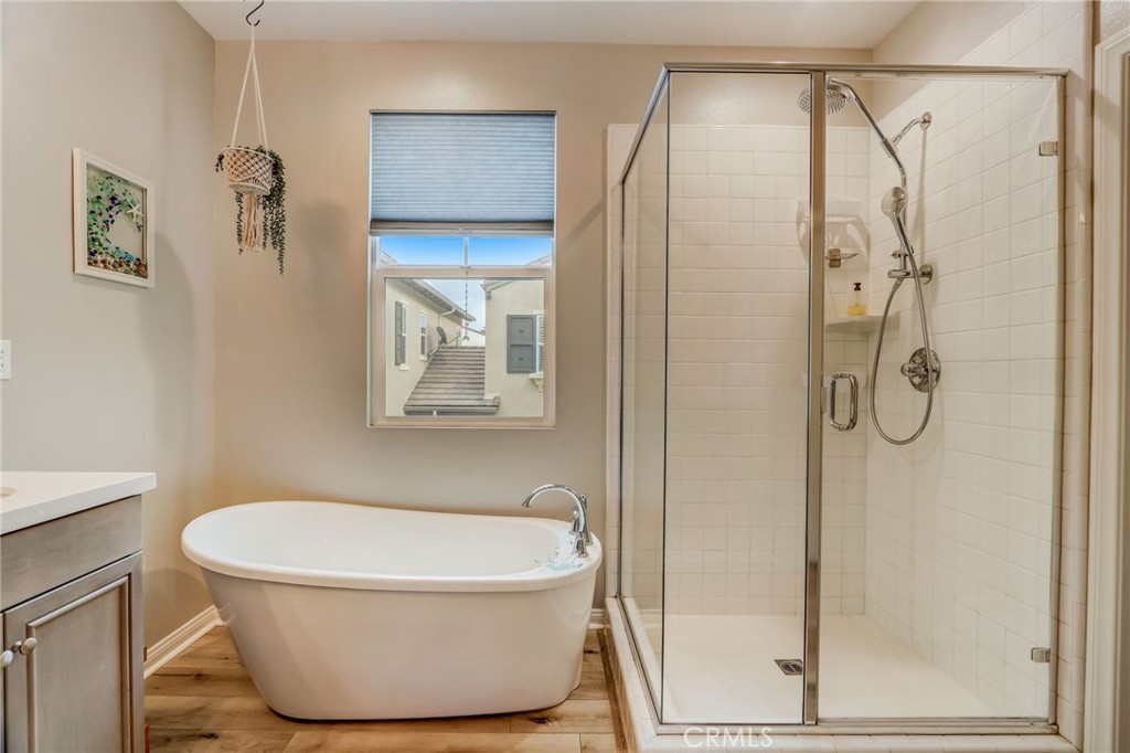 193 Stonegate Road Camarillo, CA 93010 - Photo 27 of 39 a bathroom with a white shower a mirror and a shower