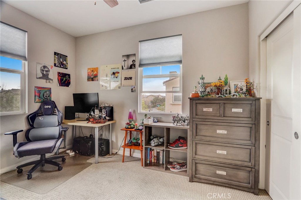 193 Stonegate Road Camarillo, CA 93010 - Photo 35 of 39 a room with furniture a air conditioner vent and a window