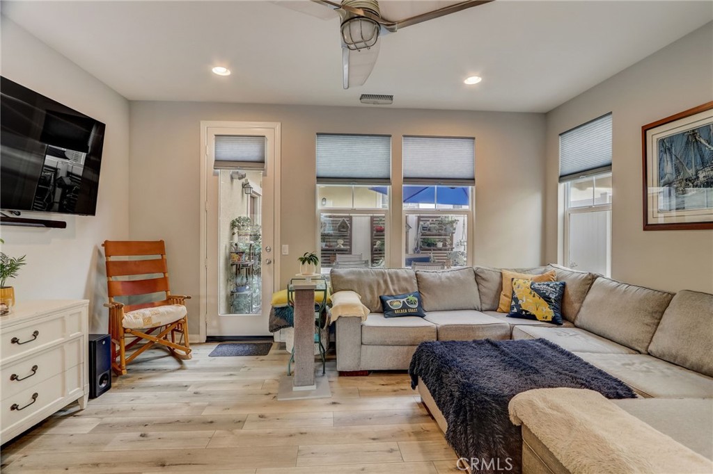 193 Stonegate Road Camarillo, CA 93010 - Photo 4 of 39 a living room with furniture and a flat screen tv
