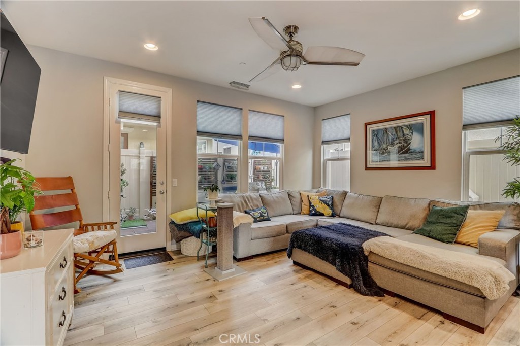 193 Stonegate Road Camarillo, CA 93010 - Photo 5 of 39 a living room with furniture and a large window