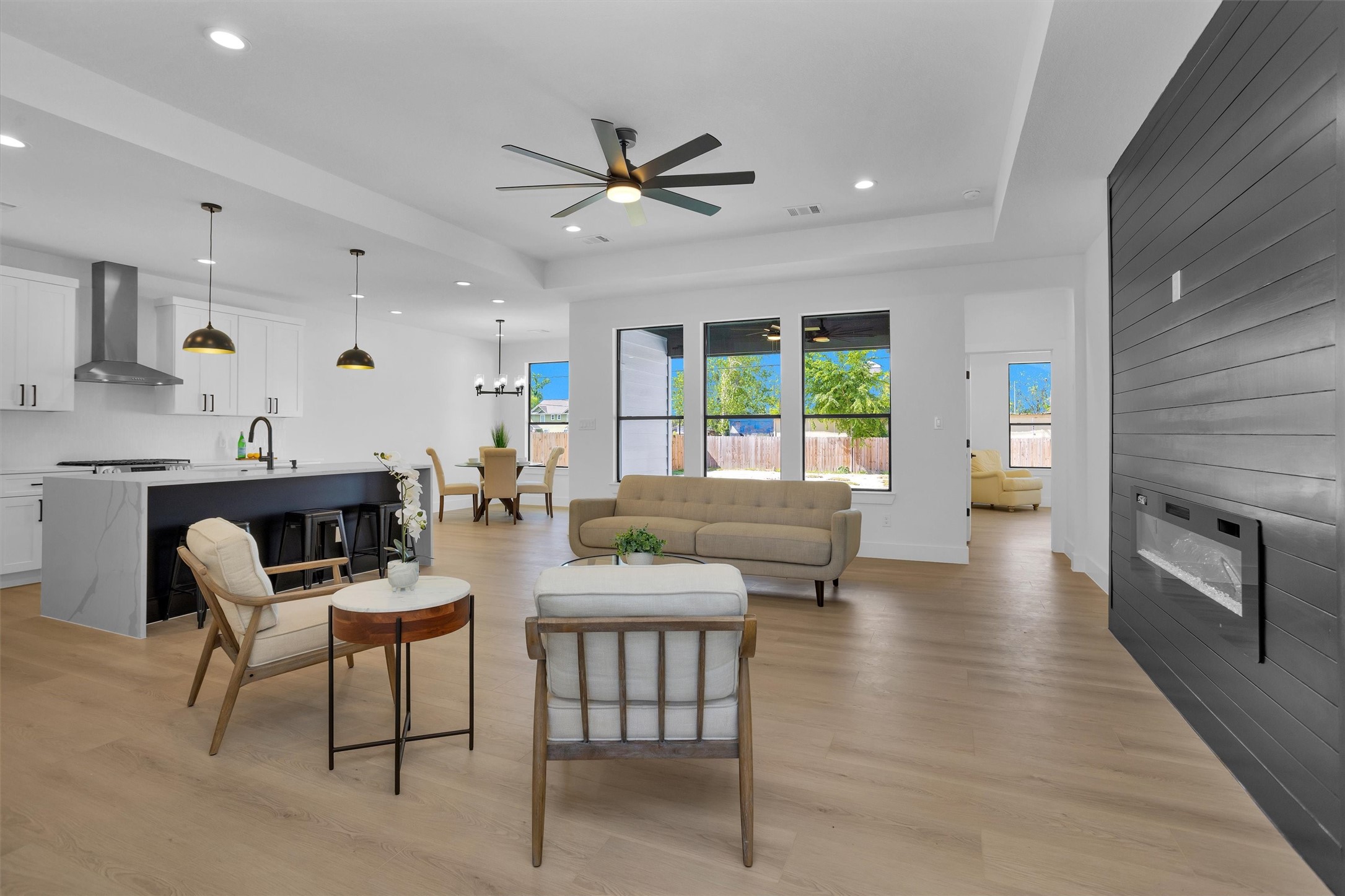 6334 Roughlock Street Houston, TX 77016 - Photo 5 of 24 a view of a dining room with furniture window and wooden floor