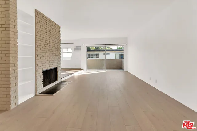 a view of a livingroom with a fireplace