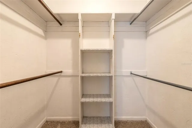 a view of an empty walk in closet