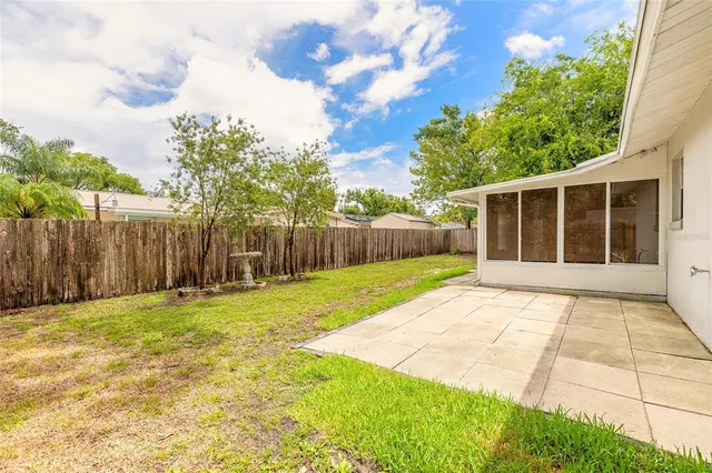 a view of a back yard of the house