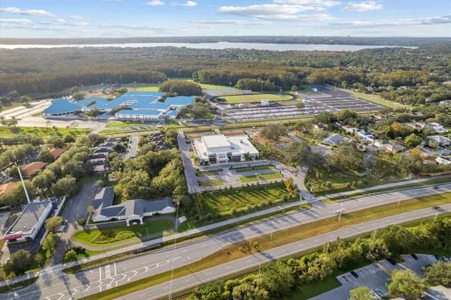 a view of swimming pool with a yard