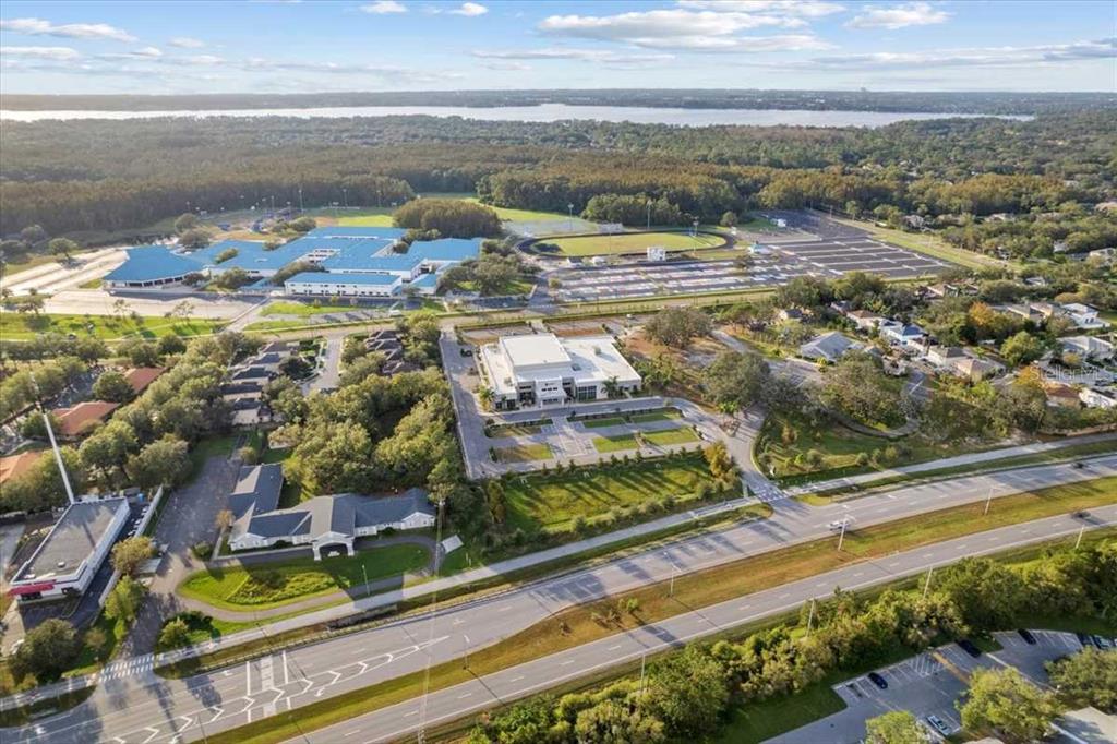 1127 Pine Ridge Circle West, Unit A2 Tarpon Springs, FL 34688 - Photo 18 of 18 a view of swimming pool with a yard