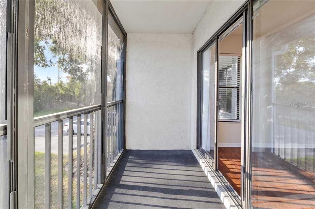 1127 Pine Ridge Circle West, Unit A2 Tarpon Springs, FL 34688 - Photo 3 of 18 a view of a balcony