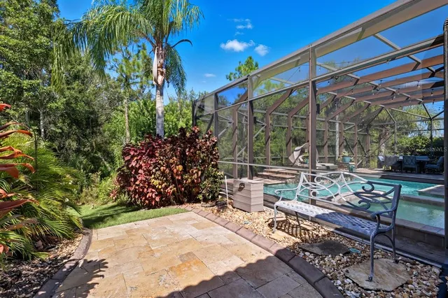 a view of yard with patio