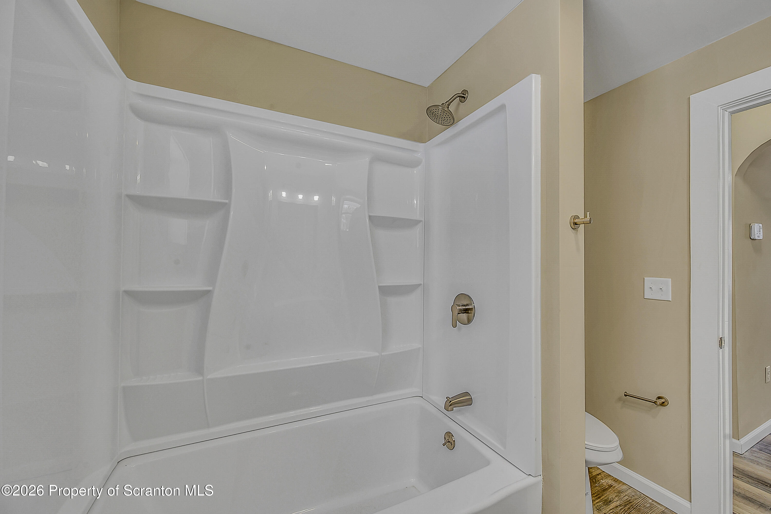 642 Bodle Road Wyoming, PA 18644 - Photo 18 of 33 a bathroom with a bathtub