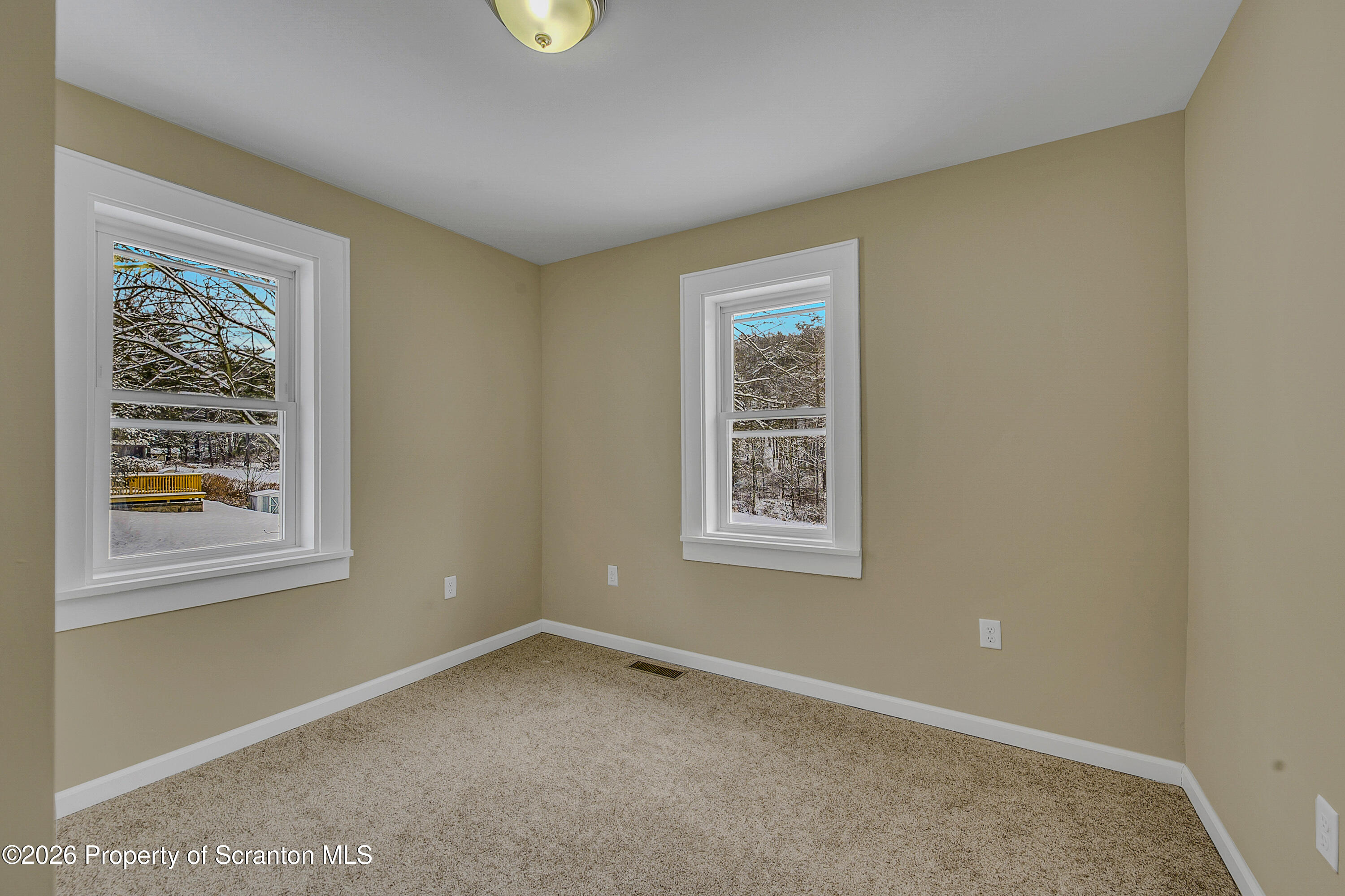 642 Bodle Road Wyoming, PA 18644 - Photo 19 of 33 an empty room with a window